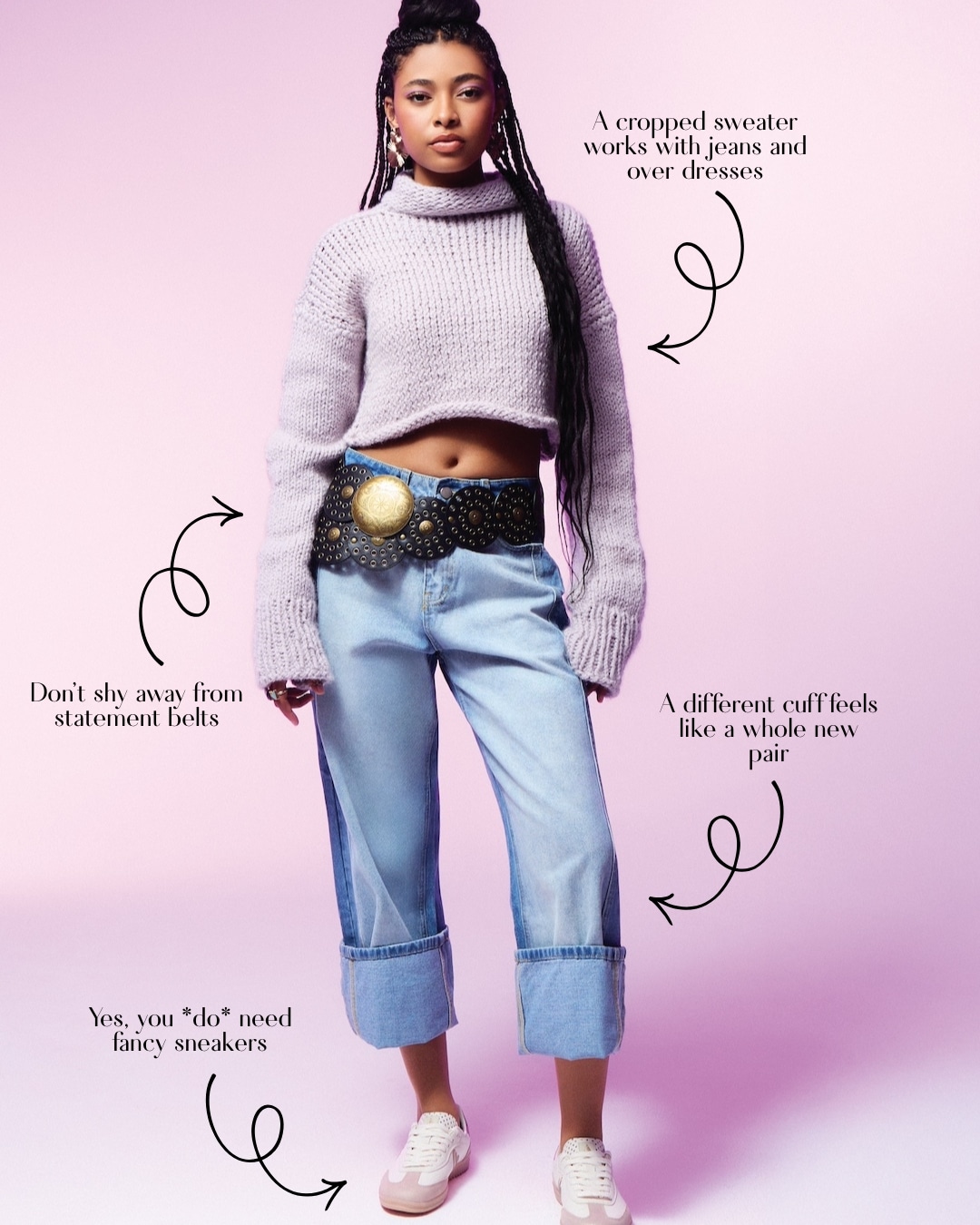 A woman stands against a pink background wearing a cropped lavender sweater, wide-leg cuffed jeans, a statement belt, and pink sneakers—your perfect spring outfit. Style tips about bold belts, sweater versatility, and cuffed jeans appear around her.