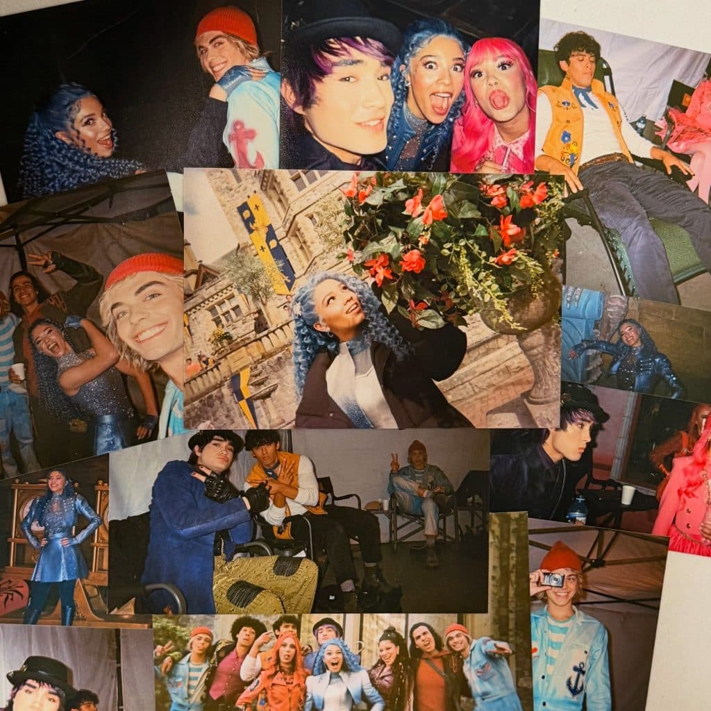 A collage of young people dressed in colorful, theatrical costumes—some inspired by Descendants’ wicked wonderland—posing, smiling, and having fun together both indoors and outdoors. Some have brightly colored hair and dramatic makeup.