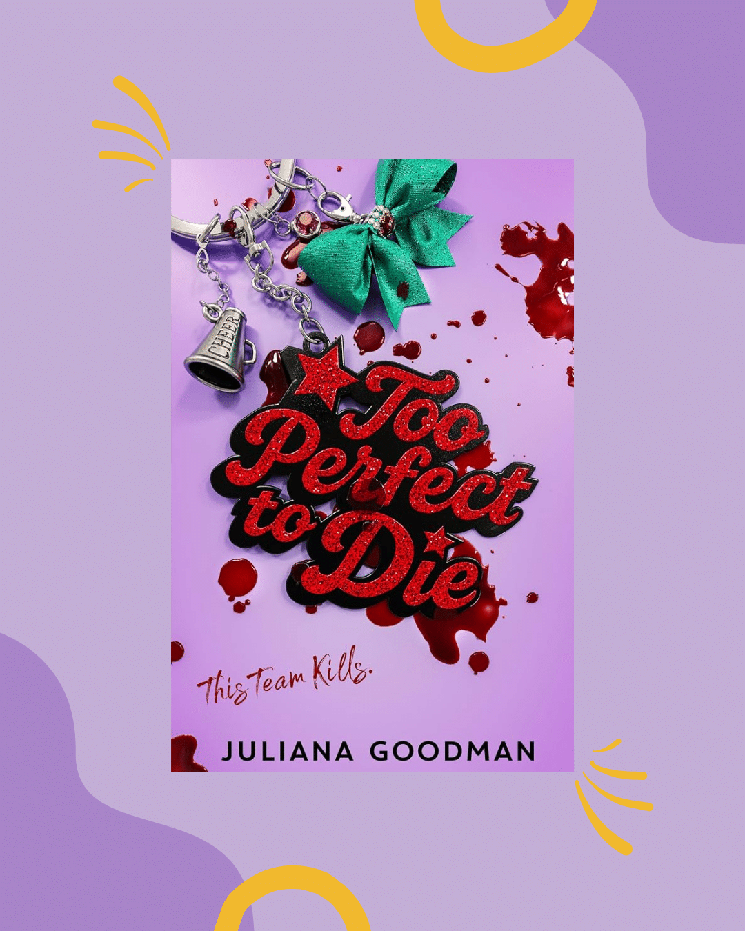 A book cover featuring a keychain with Too Perfect to Die in red glitter, a green bow, and blood splatters on a purple background perfectly sets the mood for your next book rec. The author’s name, Juliana Goodman, is at the bottom.